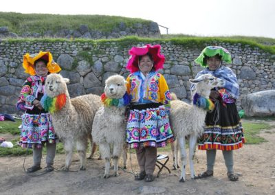 Peruvian women and their llamas, Cuzco, Peru